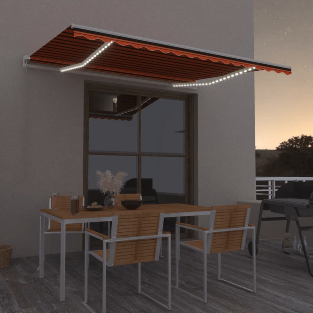 Berkfield Manual Retractable Awning with LED 450x350 cm Orange and Brown